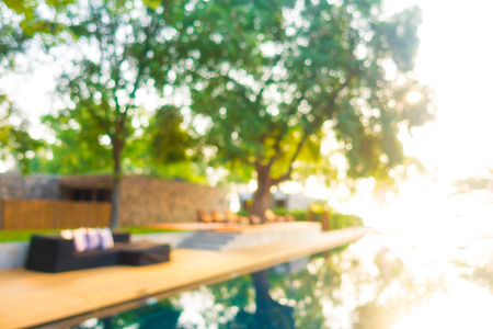Abstract blur defocused swimming pool in luxury hotel resort for backgroundの写真素材