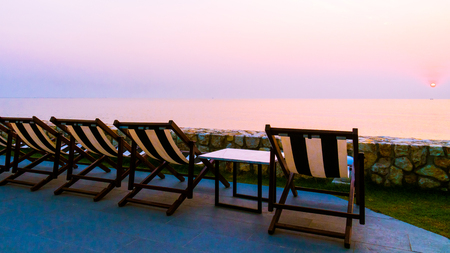 Beach bed and chair with beach and sea - Vacation conceptの写真素材