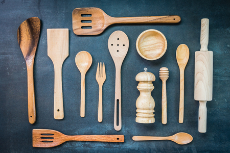 Kitchen utensils with copy space on black stone backgroundの写真素材