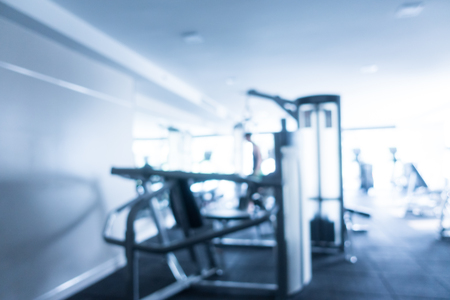 Abstract blur defocused fitness equipment and gym interior for backgroundの写真素材