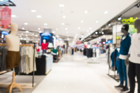 Abstract blur and defocused shopping mall in department store interior for backgroundの写真素材