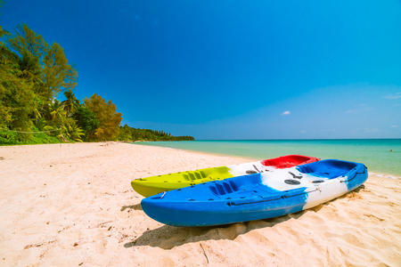 Beautiful paradise beach and sea with kayak boat - Holiday vacation conceptの写真素材