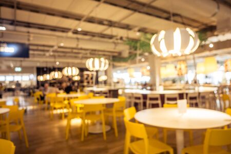 Abstract blur and defocused coffee shop cafe and restaurant interior for backgroundの写真素材