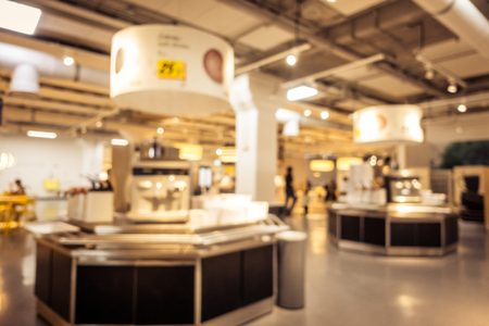 Abstract blur and defocused coffee shop cafe and restaurant interior for backgroundの写真素材