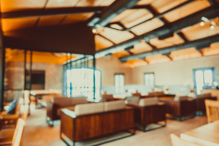 Abstract blur and defocused coffee shop cafe and restaurant interior for background - Vintage Filterの写真素材