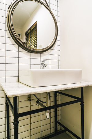 Faucet and sink decoration in bathroom interiorの写真素材