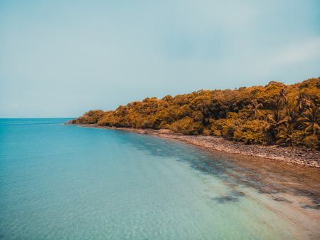 Beautiful nature tropical beach and sea with kayak boat and coconut palm tree on paradise island for travel vacationの写真素材
