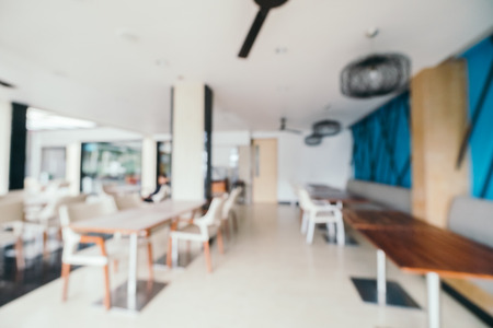 Abstract blur and defocused coffee shop and restaurant interior for backgroundの写真素材