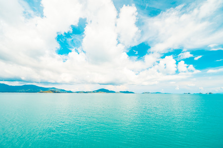 Beautiful white cloud on blue sky and sea or ocean for background