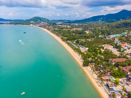 Aerial view of beautiful tropical beach and sea with palm and other tree in koh samui island for travel and vacationの写真素材