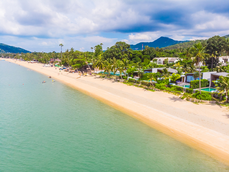 Aerial view of beautiful tropical beach and sea with palm and other tree in koh samui island for...