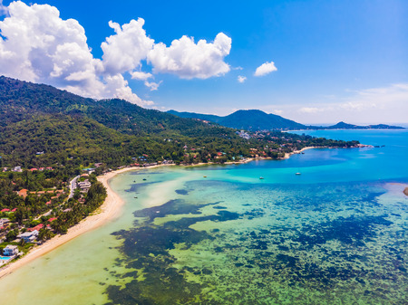 Aerial view of beautiful tropical beach and sea with palm and other tree in koh samui island for travel and vacationの写真素材
