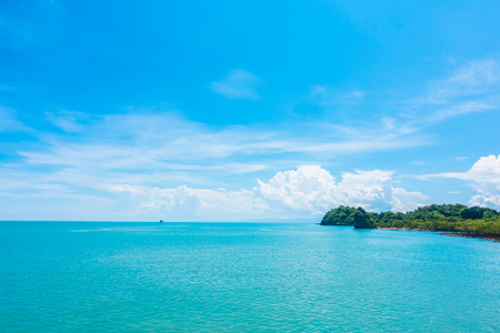 Beautiful sea and ocean with cloud on blue sky backgroundの写真素材