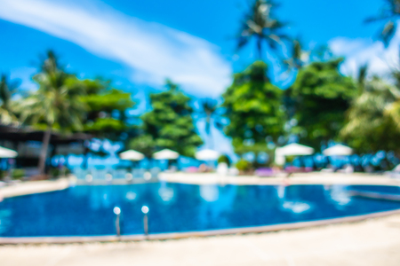 Abstract blur and defocused outdoor swimming pool in luxury hotel and resort for holiday travel and vacationの写真素材