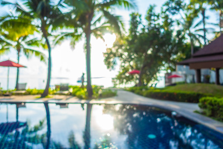Abstract blur and defocused beautiful outdoor swimming pool in hotel and resort for travel and vacationの写真素材