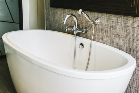 Beautiful luxury white bathtub decoration in bathroom interiorの写真素材