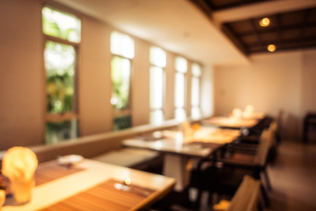 Abstract blur and defocused restaurant and coffee shop interior for backgroundの写真素材