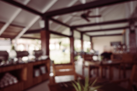 Abstract blur and defocused restaurant and coffee shop interior for background - Vintage Filterの写真素材