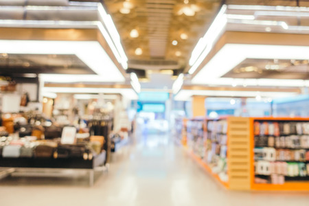 Abstract blur and defocused shopping mall in department store interior for backgroundの写真素材