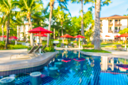 Abstract blur and defocused beautiful outdoor swimming pool in hotel and resort for travel and vacationの写真素材