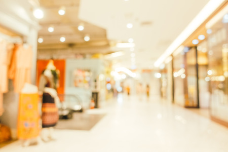 Abstract blur and defocused shopping mall in department store interior for backgroundの写真素材