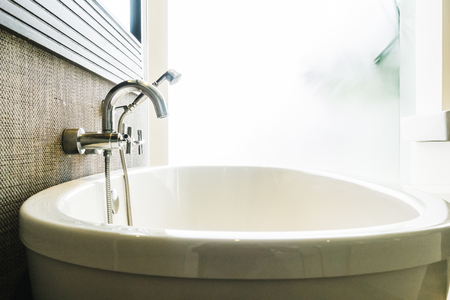 Beautiful luxury white bathtub decoration in bathroom interiorの写真素材