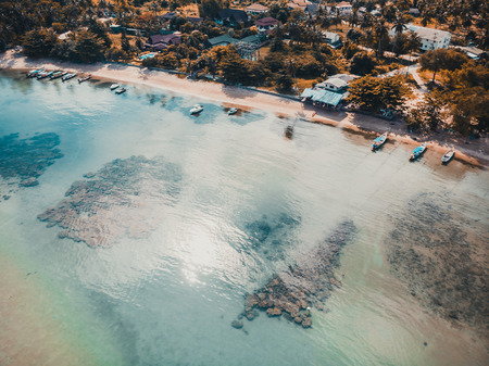 Aerial view of beautiful tropical beach and sea with palm and other tree in koh samui island for...