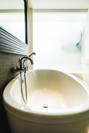 Beautiful luxury white bathtub decoration in bathroom interiorの写真素材
