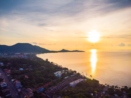 Aerial view of beautiful tropical beach and sea with palm and other tree in koh samui island Thailand at sunrise time for vacation and travelの写真素材