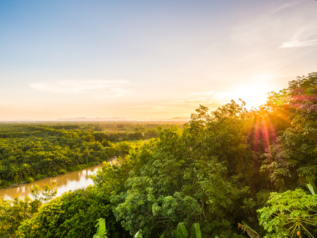 Beautiful aerial view with green forest landscape at twilight and sunset time for travel and vacationの写真素材