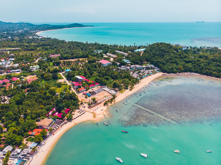Aerial view of beautiful tropical beach and sea with trees on island for travel and vacationの写真素材