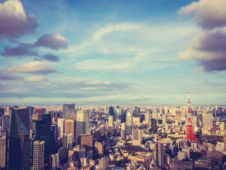 Beautiful Architecture and building around tokyo city with tokyo tower in japan with blue sky and white cloudのeditorial素材