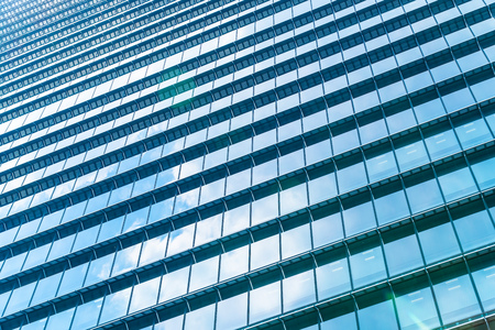 Beautiful architecture business office building with window glass pattern in the skyscraper cityの写真素材