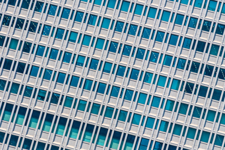 Beautiful architecture business office building with window glass pattern in the skyscraper city