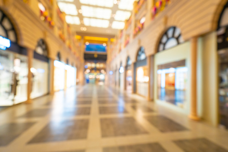 Abstract blur and defocused shopping mall of department store interior for backgroundの写真素材