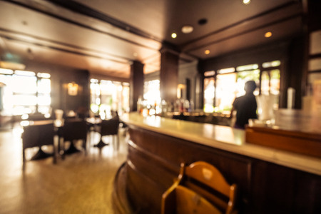 Abstract blur restaurant and coffee shop cafe interior for backgroundの写真素材