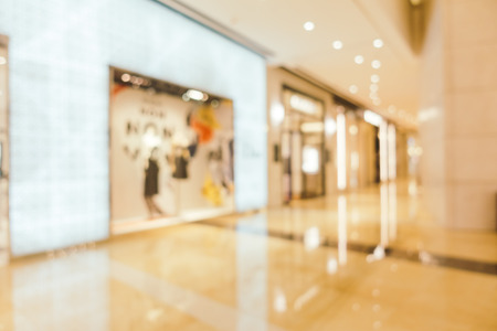 Abstract blur and defocused shopping mall of department store interior for backgroundの写真素材