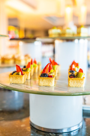 Sweet dessert bakery catering buffet in restaurant and coffee shop cafeの写真素材
