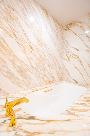 Beautiful luxury white bathtub and faucet decoration interior of bathroomの写真素材