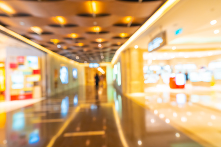 Abstract blur and defocused shopping mall of department store interiorの写真素材