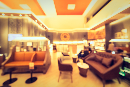 Abstract blur and defocused coffee shop and restaurant interior for backgroundの写真素材