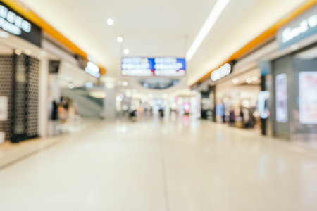 Abstract blur and defocused shopping mall of department store interior for backgroundの写真素材