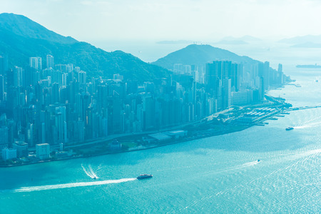Beautiful architecture building exterior cityscape of hong kong city skyline with blue sky backgroundの写真素材