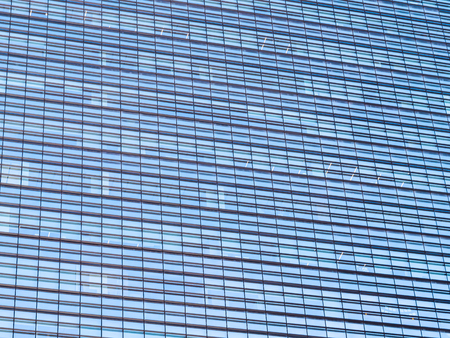 Beautiful business office building skyscraper with window glass textures for background