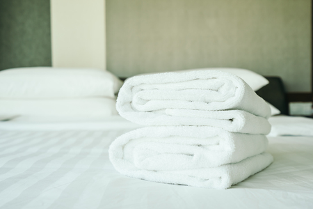 White towel on bed decoration interior of bedroomの写真素材