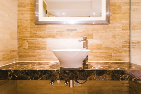 White sink and faucet decoration in bathroom interiorの写真素材