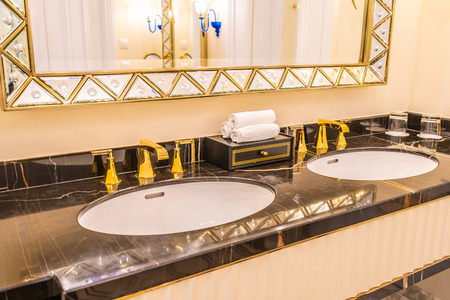 beautiful luxury faucet and sink decoration in bathroom interiorの写真素材