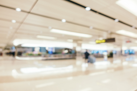 Abstract blur and defocused airport terminal interior for backgroundの写真素材
