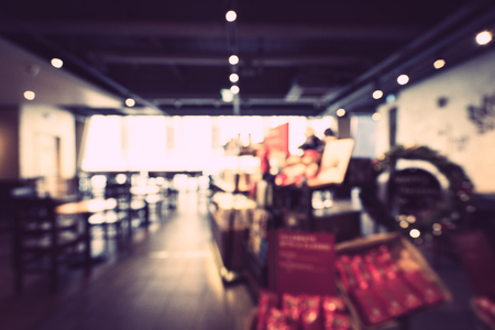 Abstract blur and defocused restaurant and coffee shop cafe interior for backgroundの写真素材