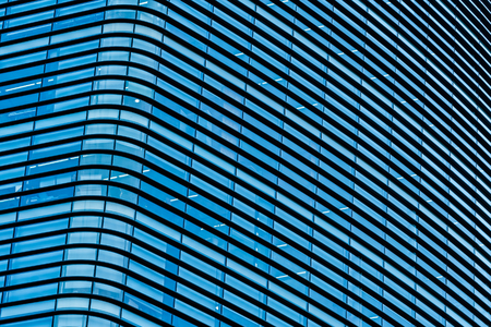 Beautiful business office building skyscraper with window glass textures for background